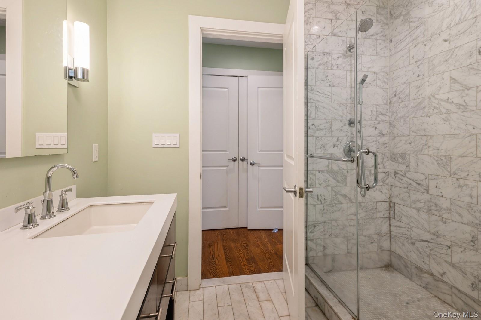 13 Island Point, Unit 13 Bronx, NY 10464 - Photo 10 of 22 Full bathroom with a stall shower, vanity