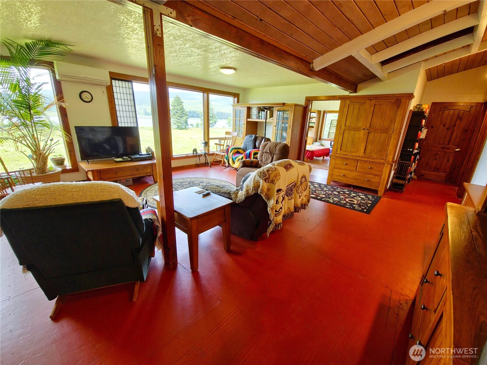 752 Parpala Road Naselle, WA 98638 - Photo 11 of 35 a living room with furniture and a flat screen tv