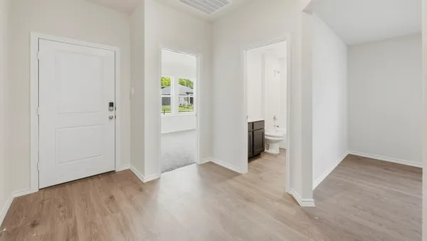 an empty room and wooden floor