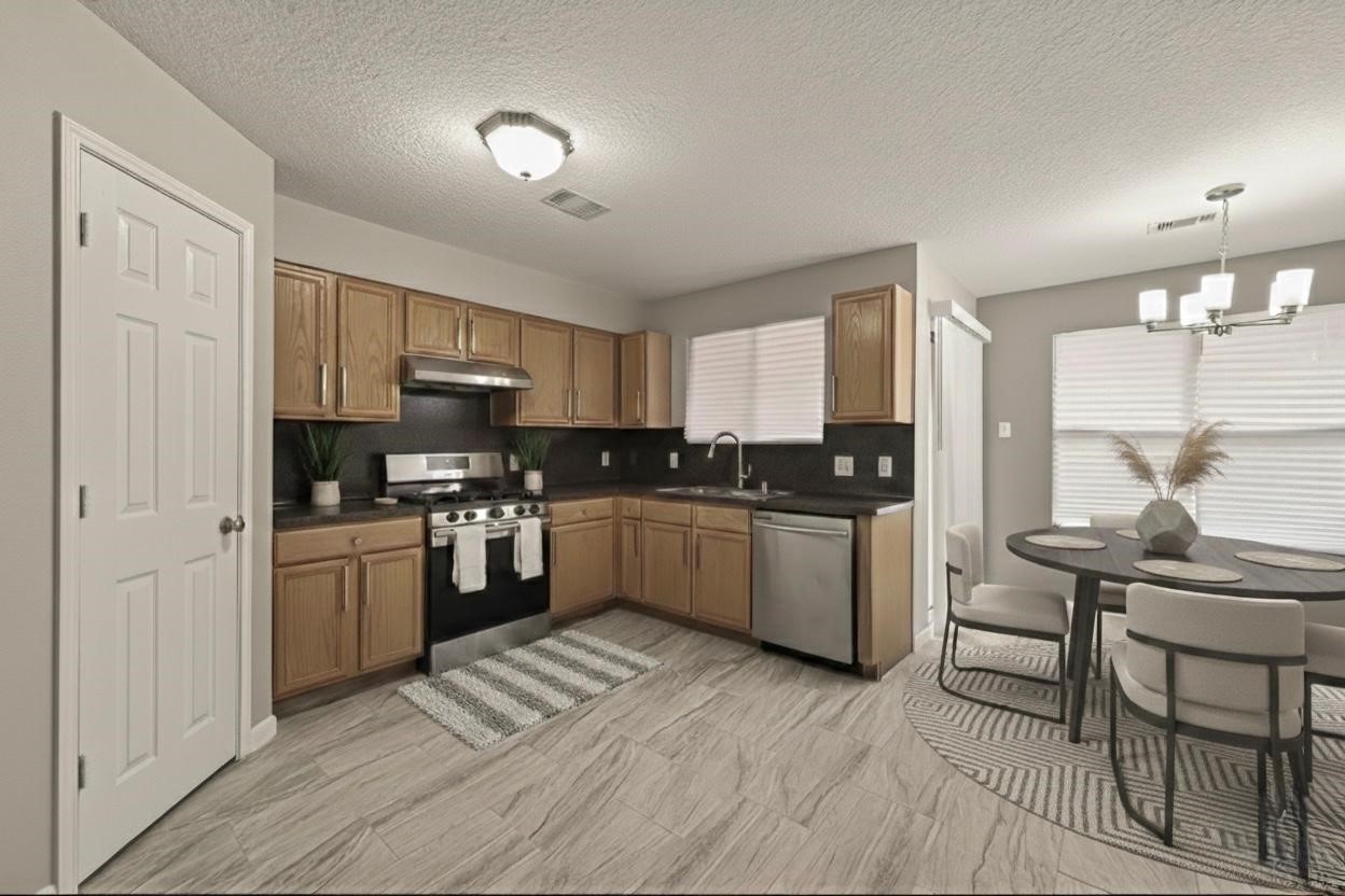 5614 Calm Court Houston, TX 77084 - Photo 11 of 32 Kitchen/Breakfast Nook - Virtually Staged