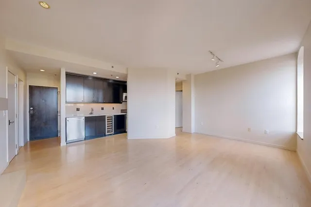 a view of a kitchen with a sink and a kitchen
