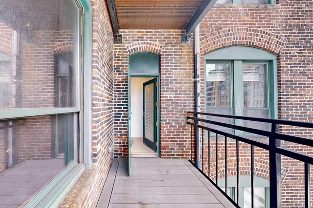 a view of a balcony with a door