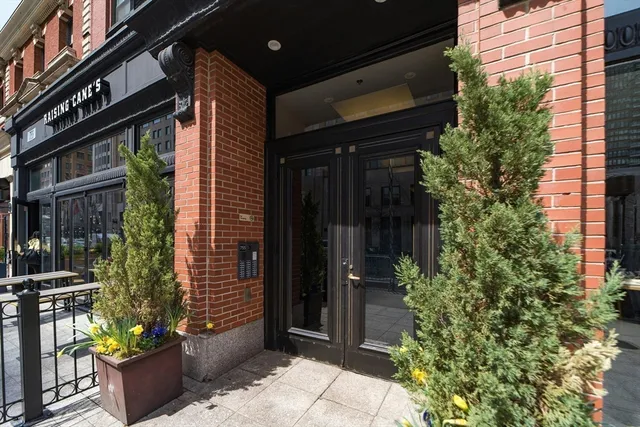 a bricked building with glass windows