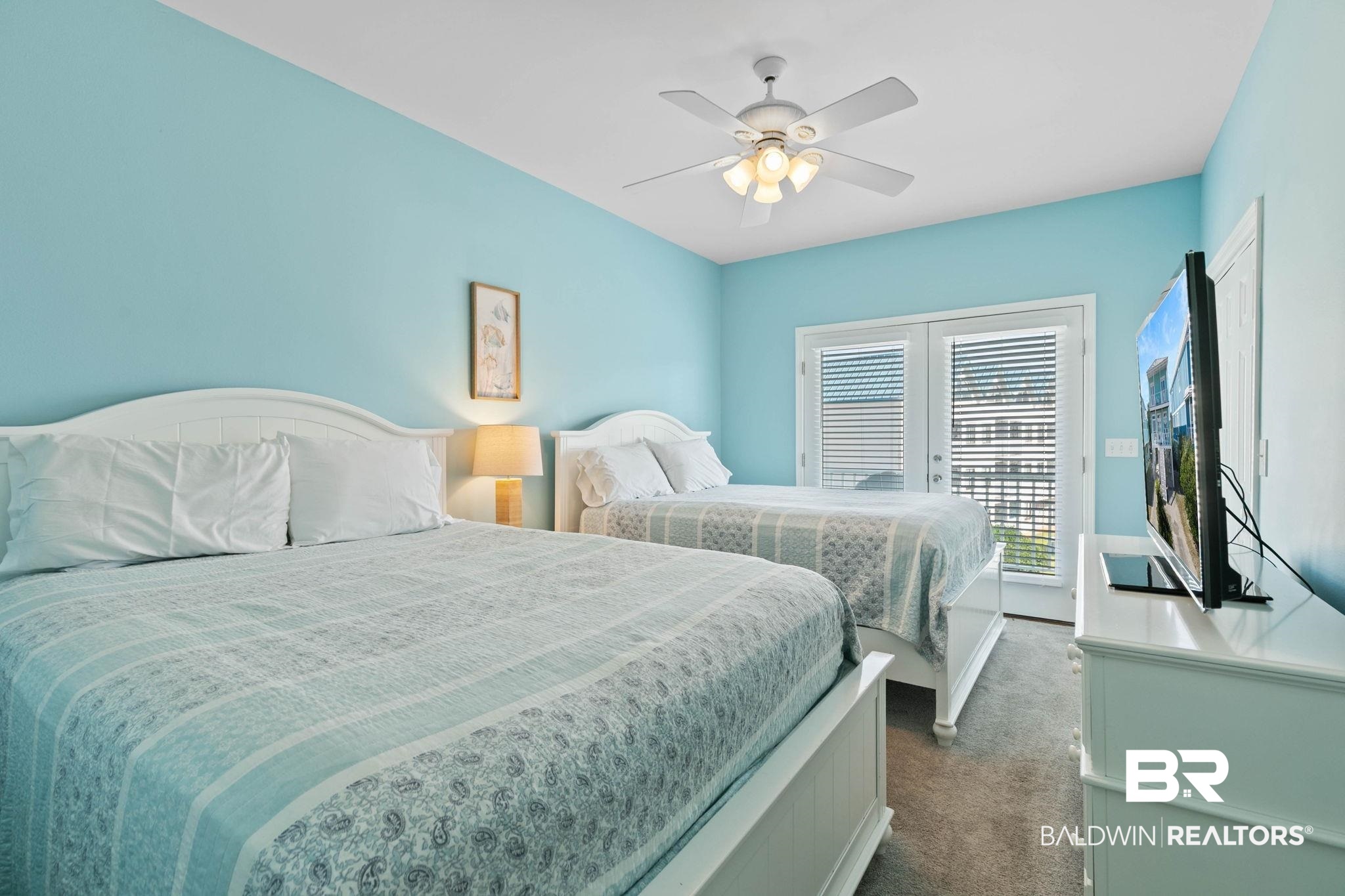 545 Plantation Road, Unit 3 Gulf Shores, AL 36542 - Photo 36 of 54 Bedroom with access to outside, dark carpet, and a ceiling fan