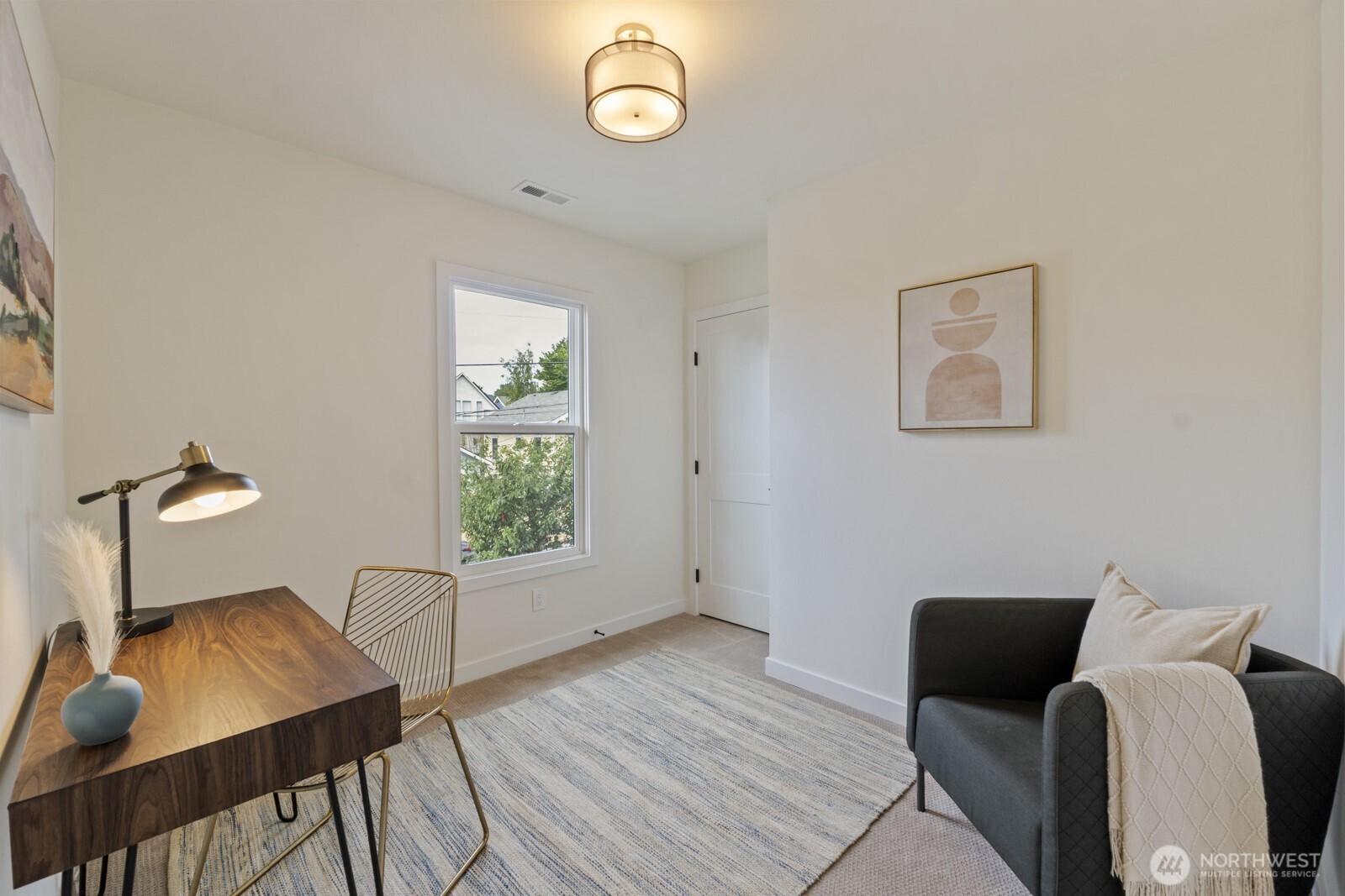 101 North 51st Street Seattle, WA 98103 - Photo 20 of 38 a view of a livingroom with furniture and wooden floor