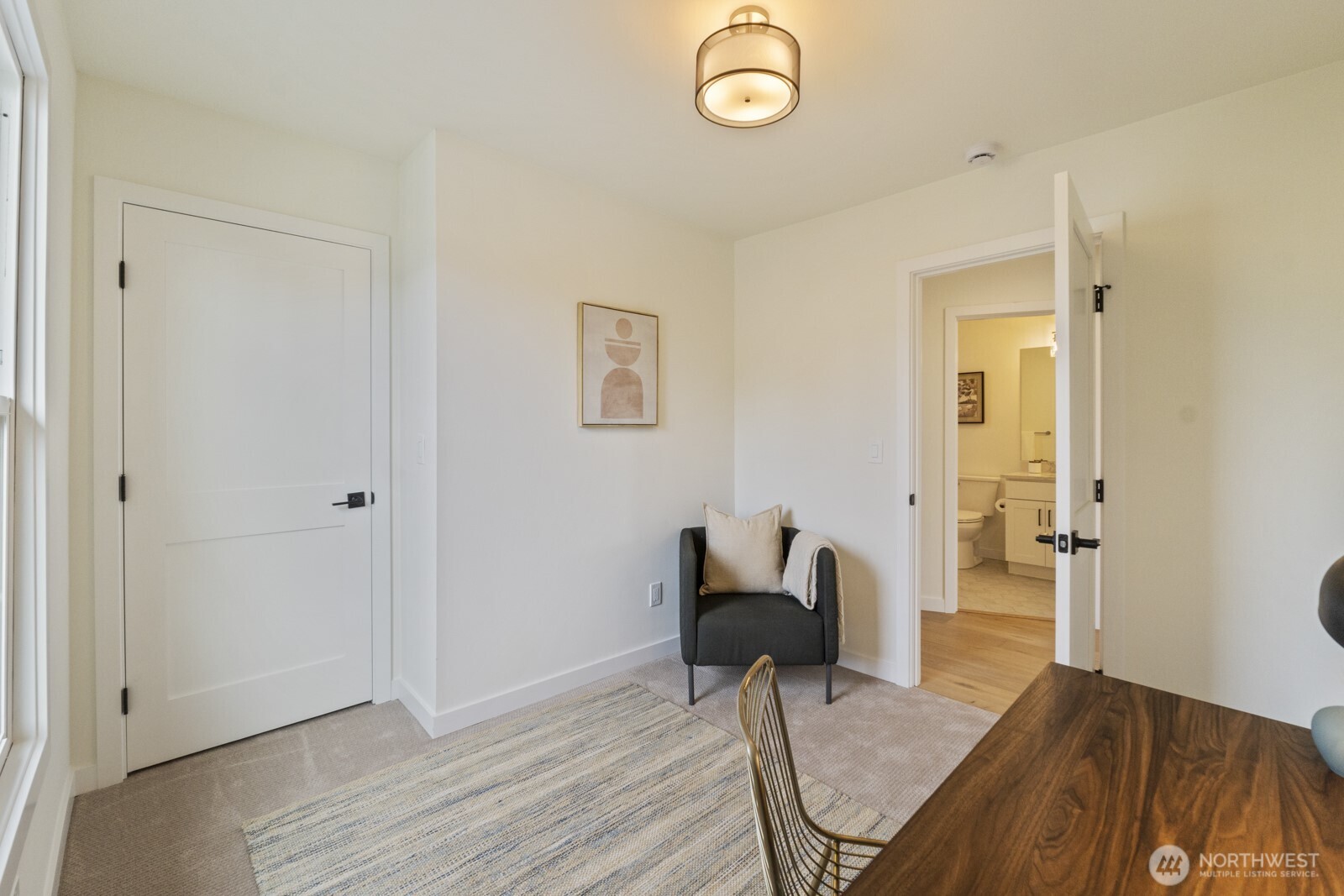 101 North 51st Street Seattle, WA 98103 - Photo 21 of 38 a view of a livingroom with furniture and hardwood floor