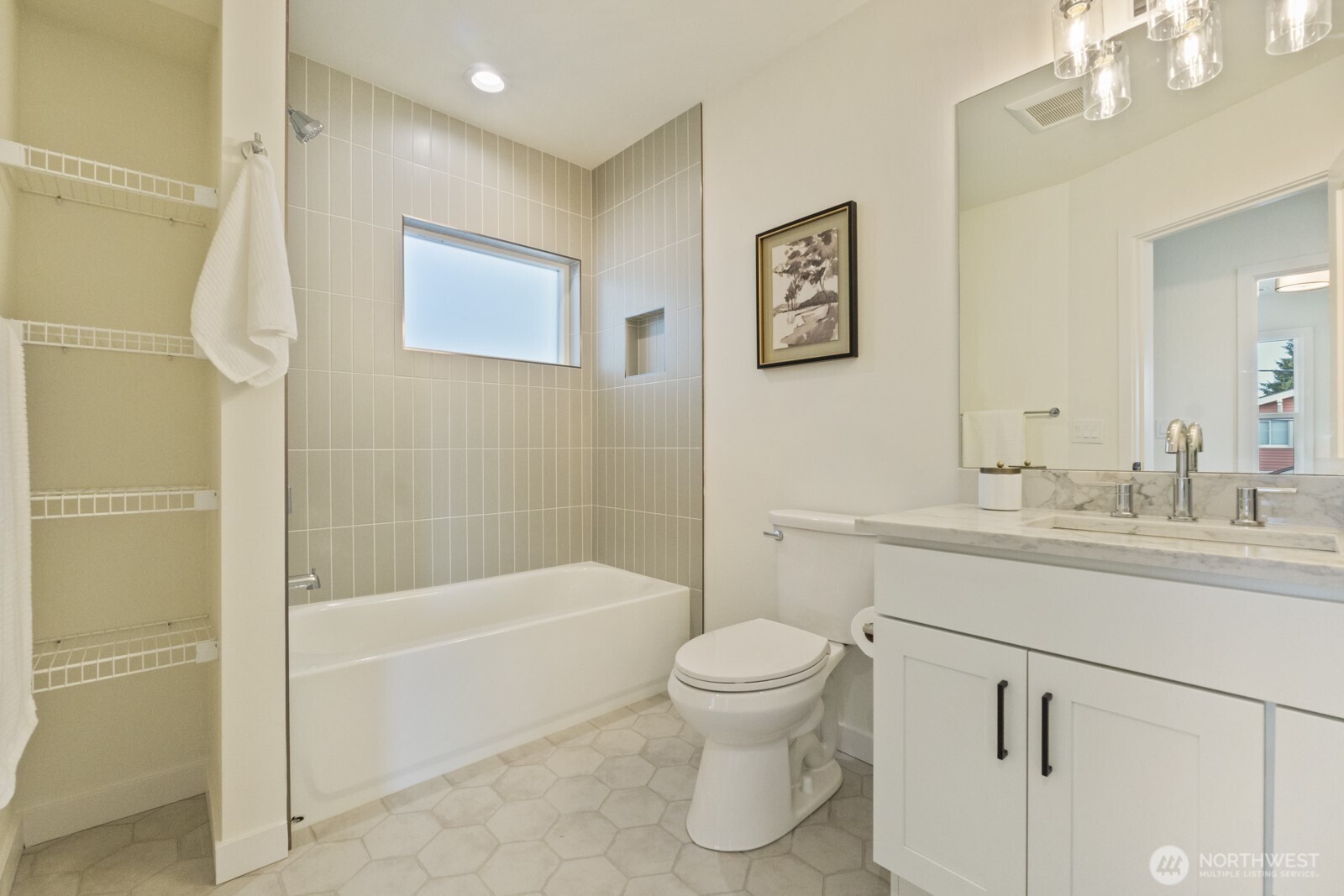 101 North 51st Street Seattle, WA 98103 - Photo 26 of 38 a bathroom with a sink toilet and shower