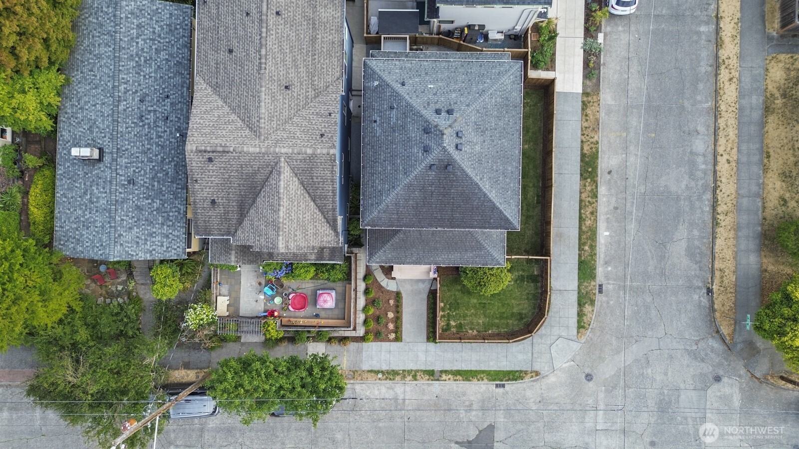 101 North 51st Street Seattle, WA 98103 - Photo 35 of 38 an aerial view of a house having yard