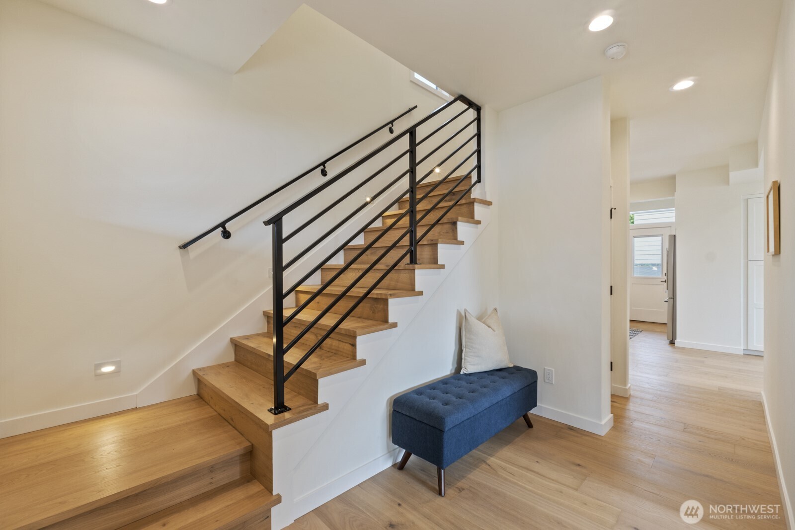 101 North 51st Street Seattle, WA 98103 - Photo 5 of 38 a view of entryway and hall with wooden floor