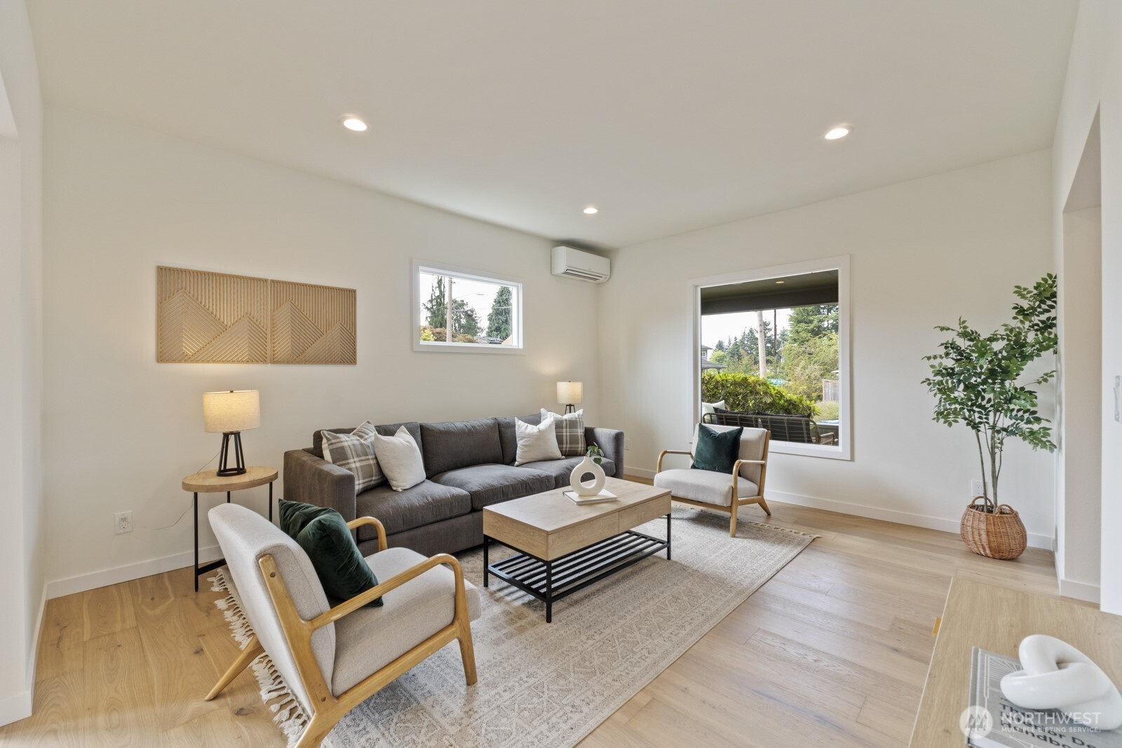 101 North 51st Street Seattle, WA 98103 - Photo 8 of 38 a living room with furniture and a potted plant