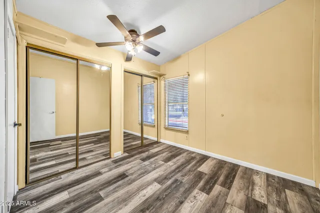 a view of a livingroom with a ceiling fan