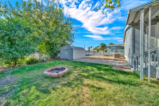 a view of a back yard of the house