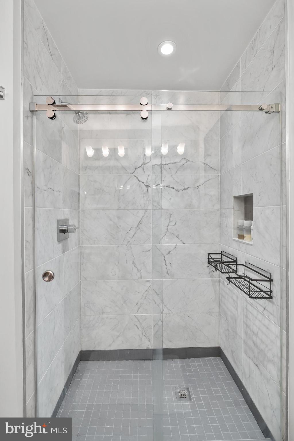1324 W Street Northwest, Unit 1 Washington, DC 20009 - Photo 25 of 37 a bathroom with a shower