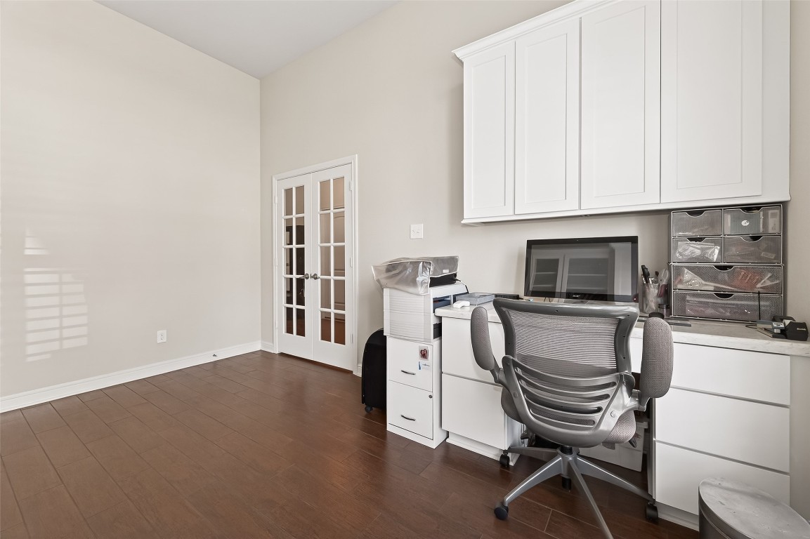 2719 Intrepid Trail Rosenberg, TX 77471 - Photo 11 of 50 a kitchen with a sink cabinets and wooden floor