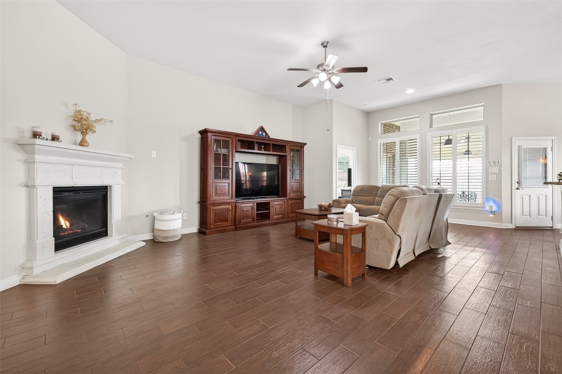 2719 Intrepid Trail Rosenberg, TX 77471 - Photo 12 of 50 a living room with furniture and a fireplace