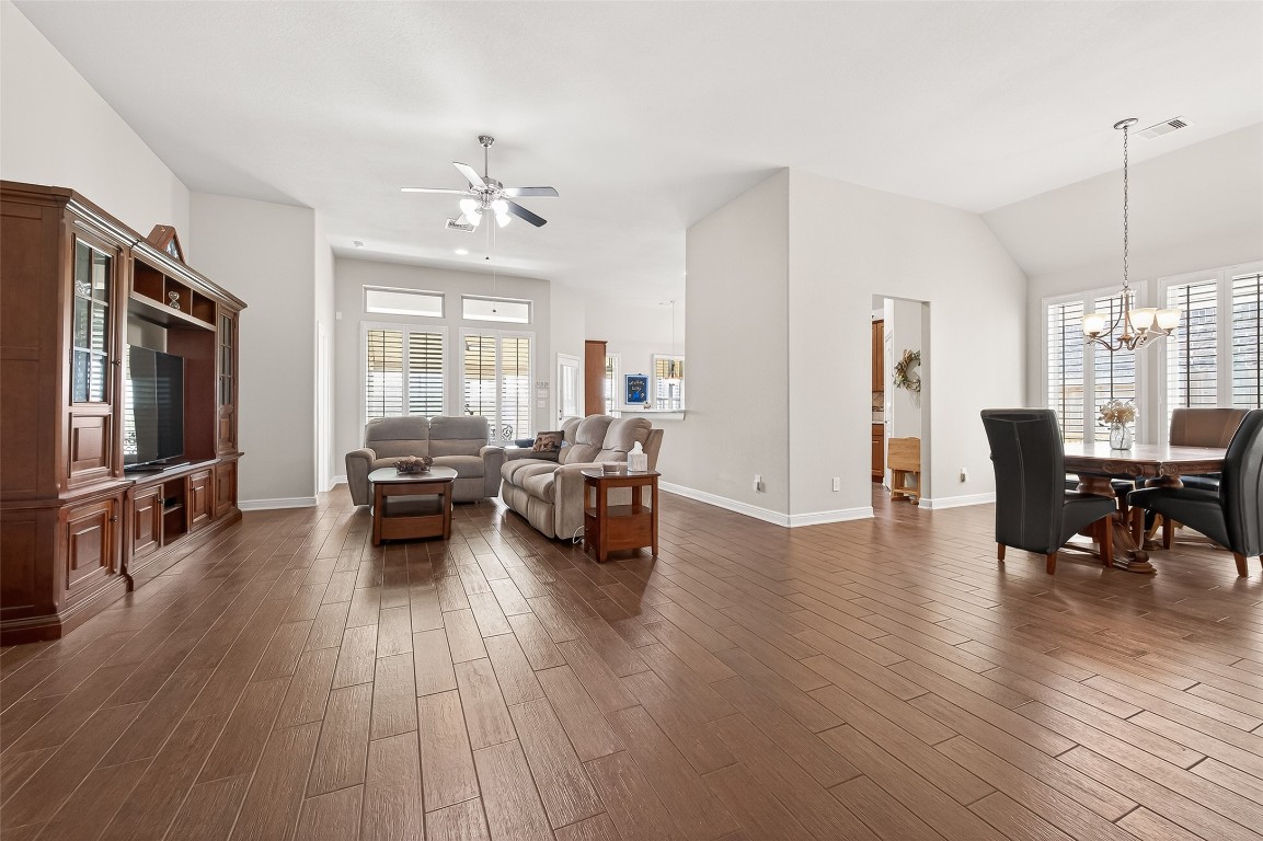 2719 Intrepid Trail Rosenberg, TX 77471 - Photo 14 of 50 a living room with furniture two window and wooden floor