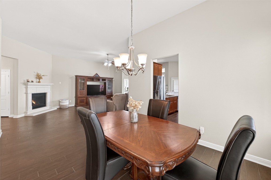 2719 Intrepid Trail Rosenberg, TX 77471 - Photo 15 of 50 a view of a dining room with furniture and wooden floor