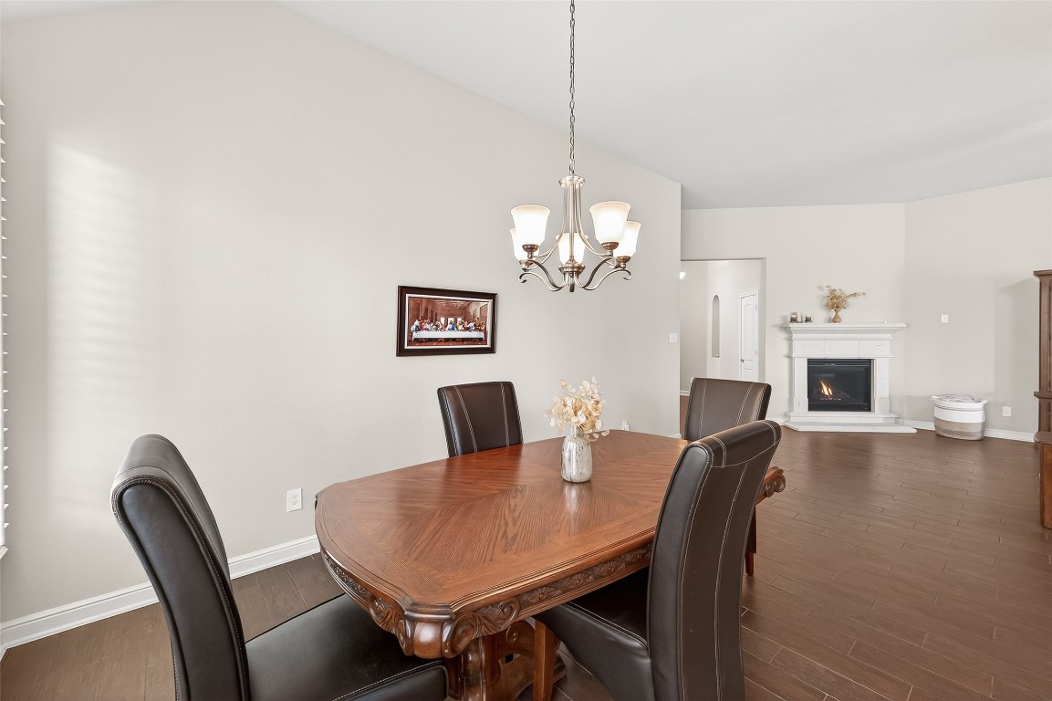 2719 Intrepid Trail Rosenberg, TX 77471 - Photo 16 of 50 a view of a dining room with furniture and wooden floor