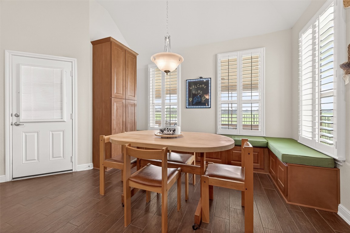 2719 Intrepid Trail Rosenberg, TX 77471 - Photo 19 of 50 a view of a dining room with furniture window and wooden floor