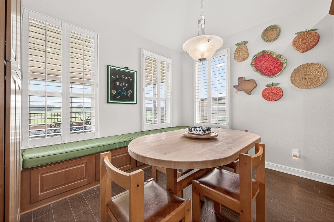 2719 Intrepid Trail Rosenberg, TX 77471 - Photo 20 of 50 a view of a dining room with furniture and chandelier