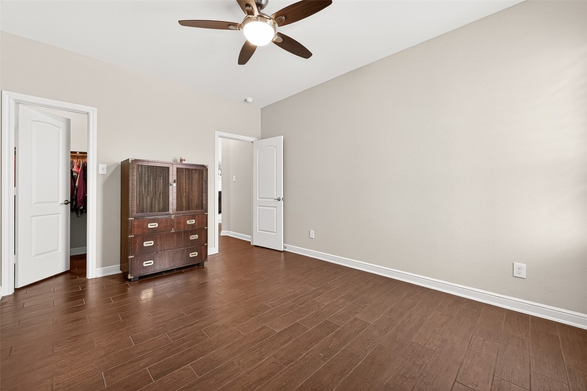 2719 Intrepid Trail Rosenberg, TX 77471 - Photo 31 of 50 a view of an empty room with window and wooden floor