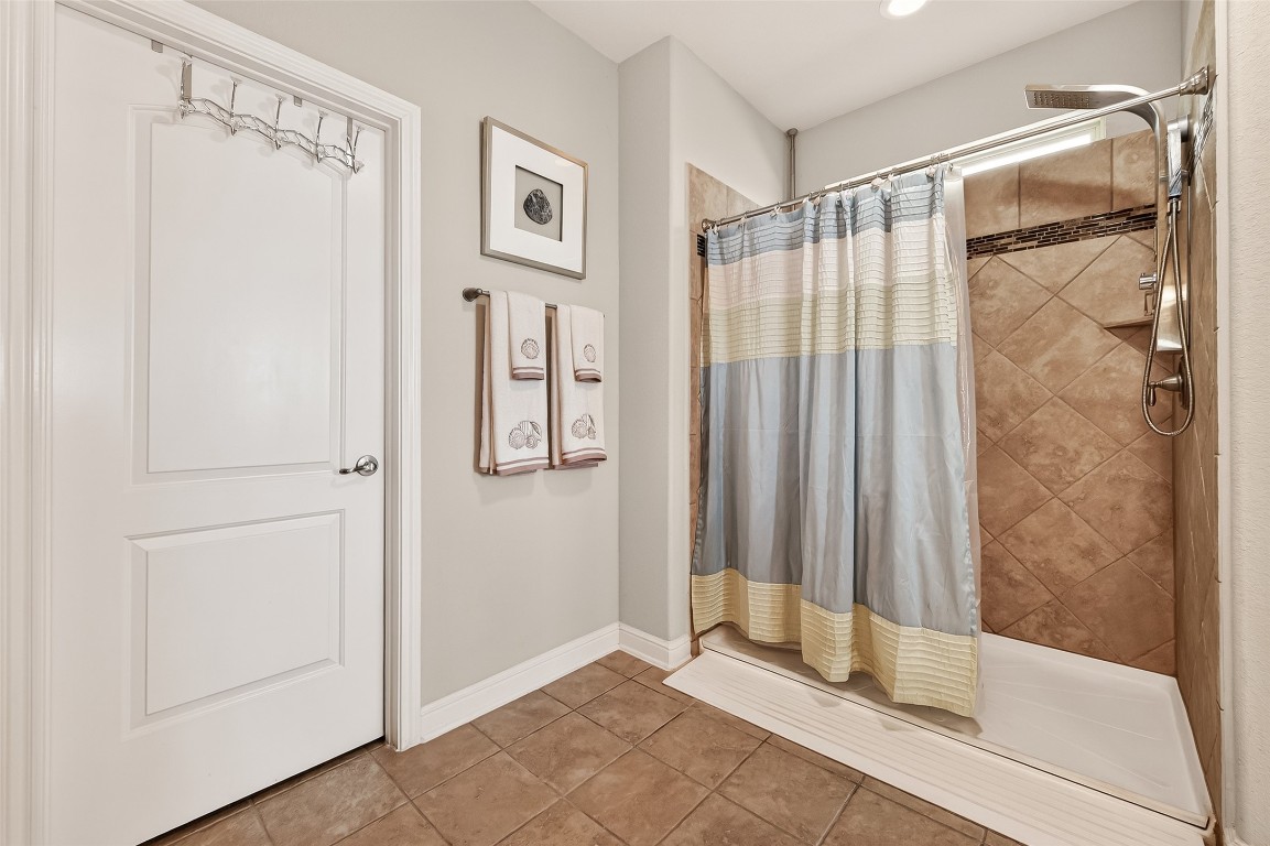 2719 Intrepid Trail Rosenberg, TX 77471 - Photo 39 of 50 a bathroom with a shower and a tub