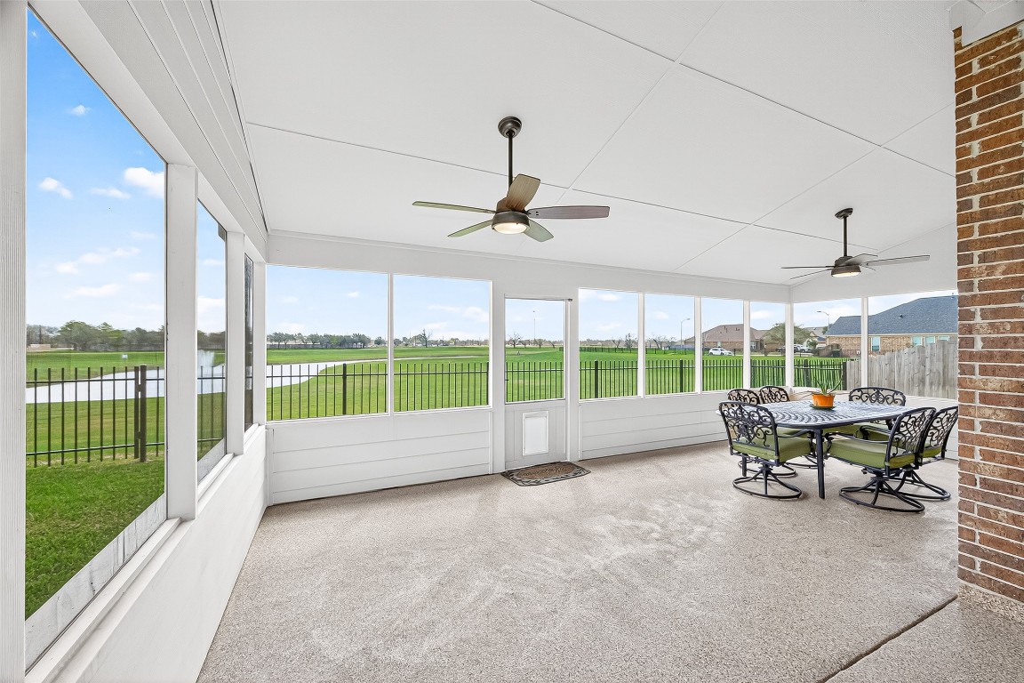 2719 Intrepid Trail Rosenberg, TX 77471 - Photo 4 of 50 a living room with furniture and floor to ceiling windows