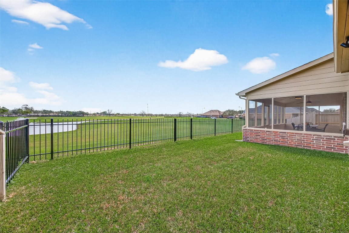 2719 Intrepid Trail Rosenberg, TX 77471 - Photo 47 of 50 a view of a house with backyard and fence