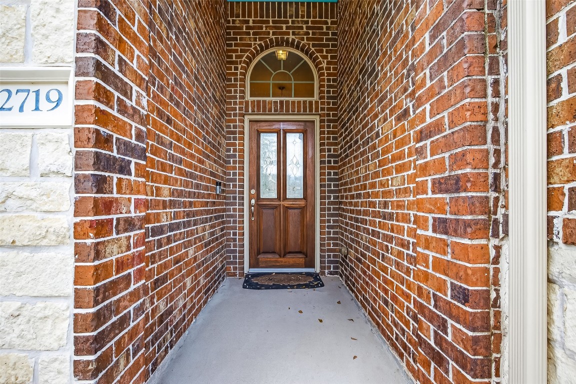 2719 Intrepid Trail Rosenberg, TX 77471 - Photo 8 of 50 a view of a door and wooden floor