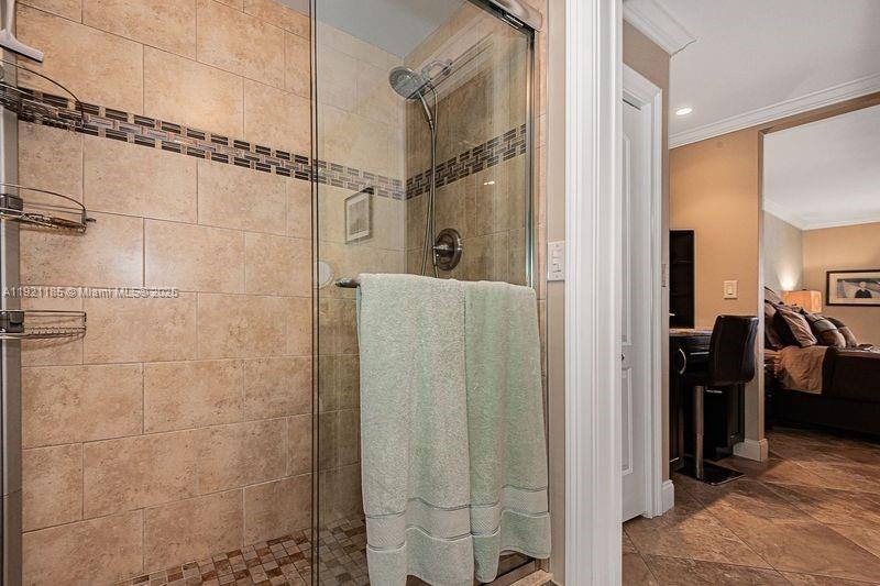 4751 Northwest 21st Street, Unit 504 Lauderhill, FL 33313 - Photo 20 of 27 a bathroom with a shower and a mirror