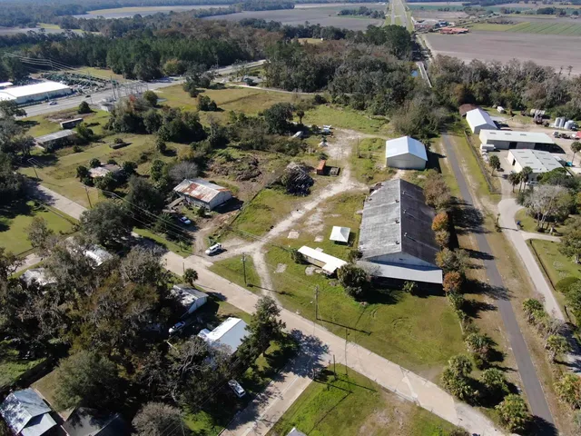 an aerial view of a house with a garden