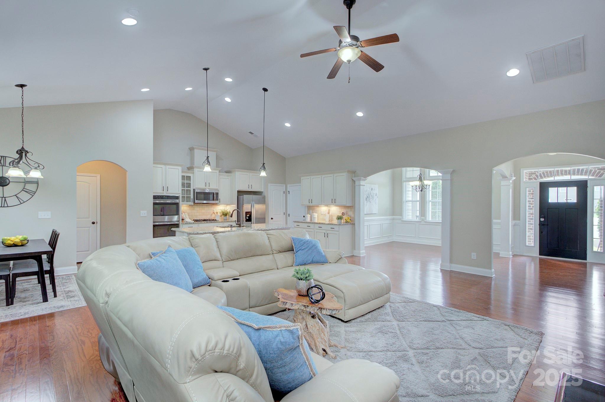 317 Annatto Way Tega Cay, SC 29708 - Photo 12 of 44 a living room with furniture and a wooden floor