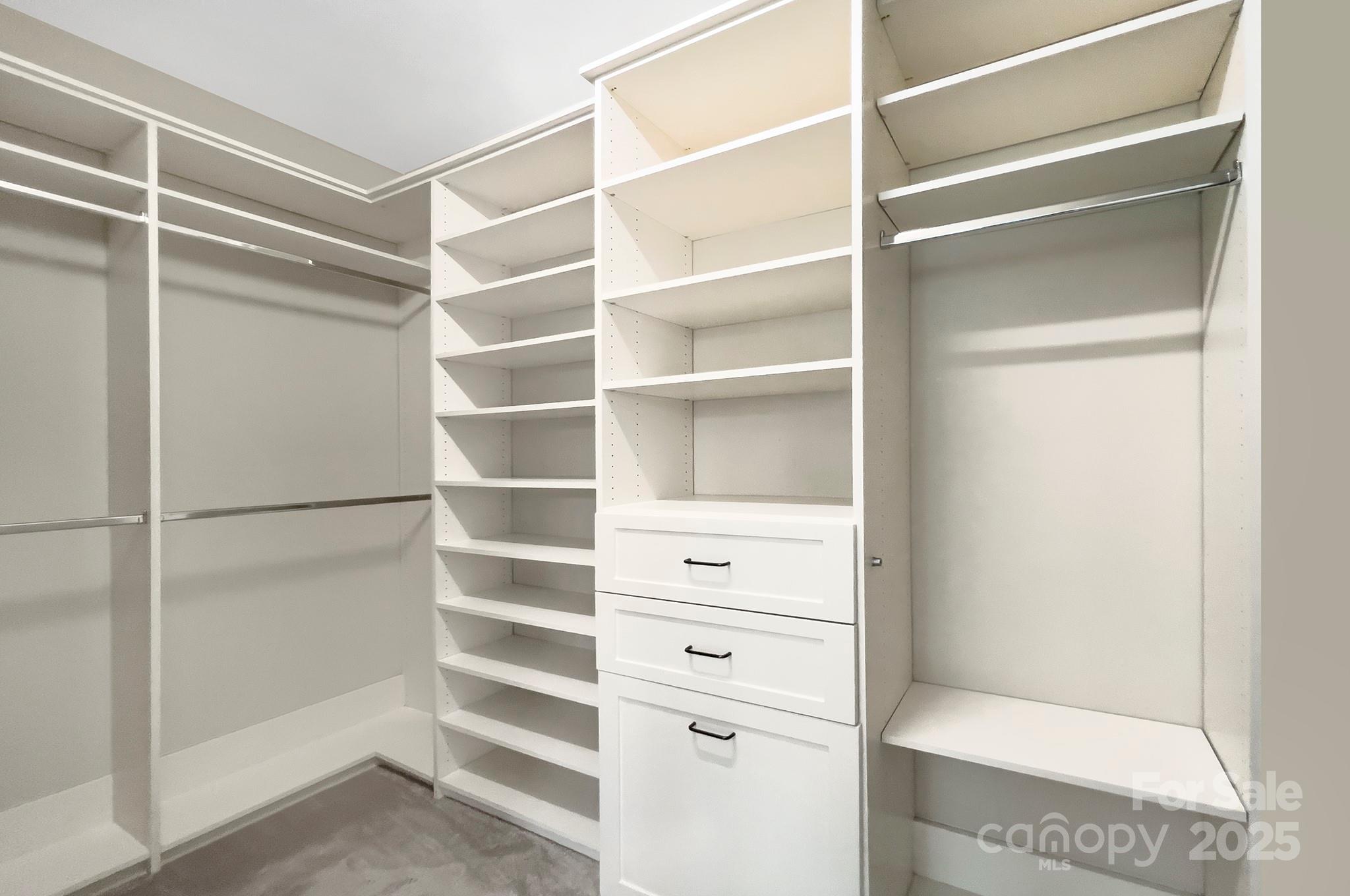 317 Annatto Way Tega Cay, SC 29708 - Photo 23 of 44 a view of an empty walk in closet