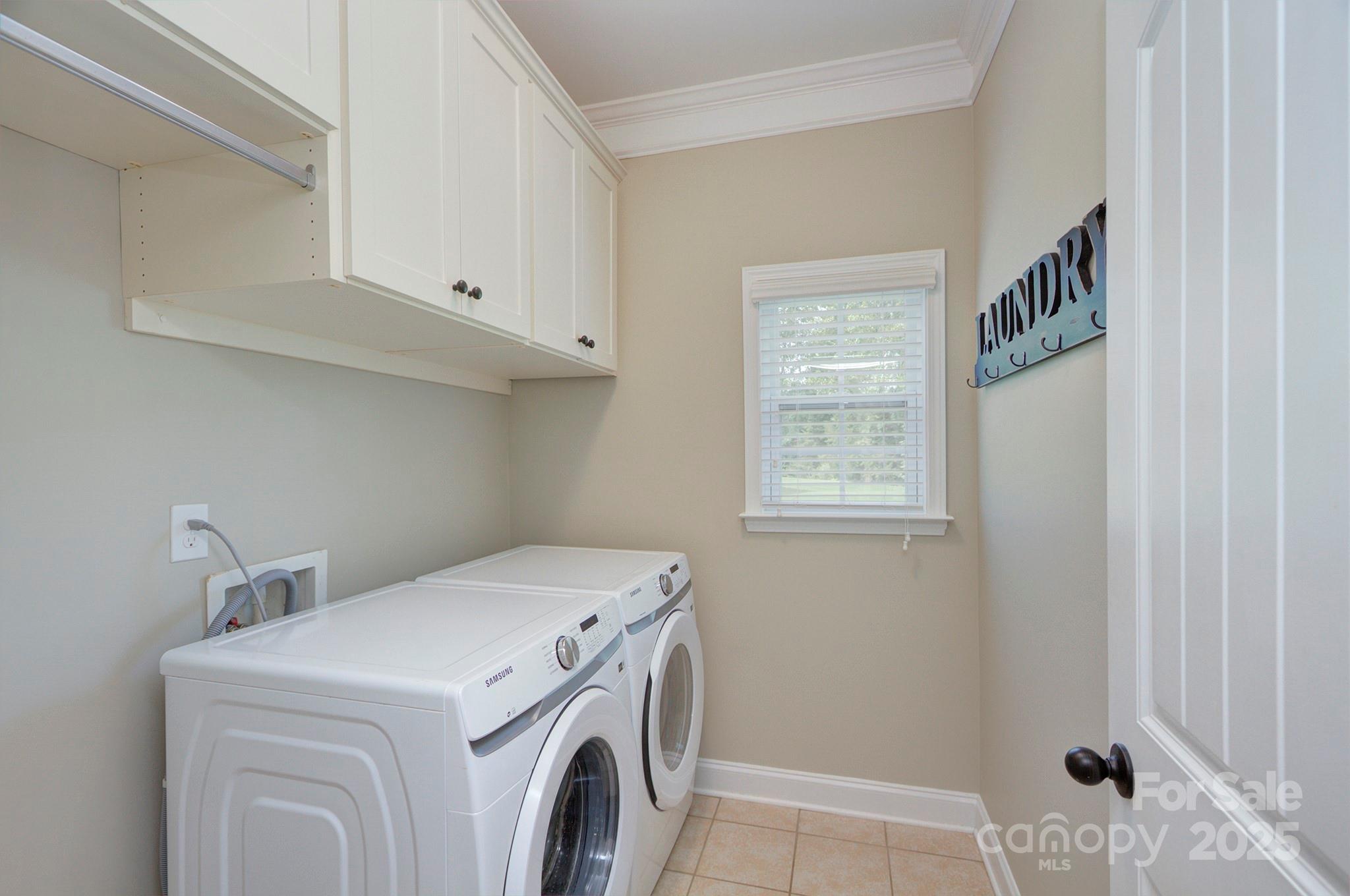 317 Annatto Way Tega Cay, SC 29708 - Photo 28 of 44 a utility room with dryer and washer