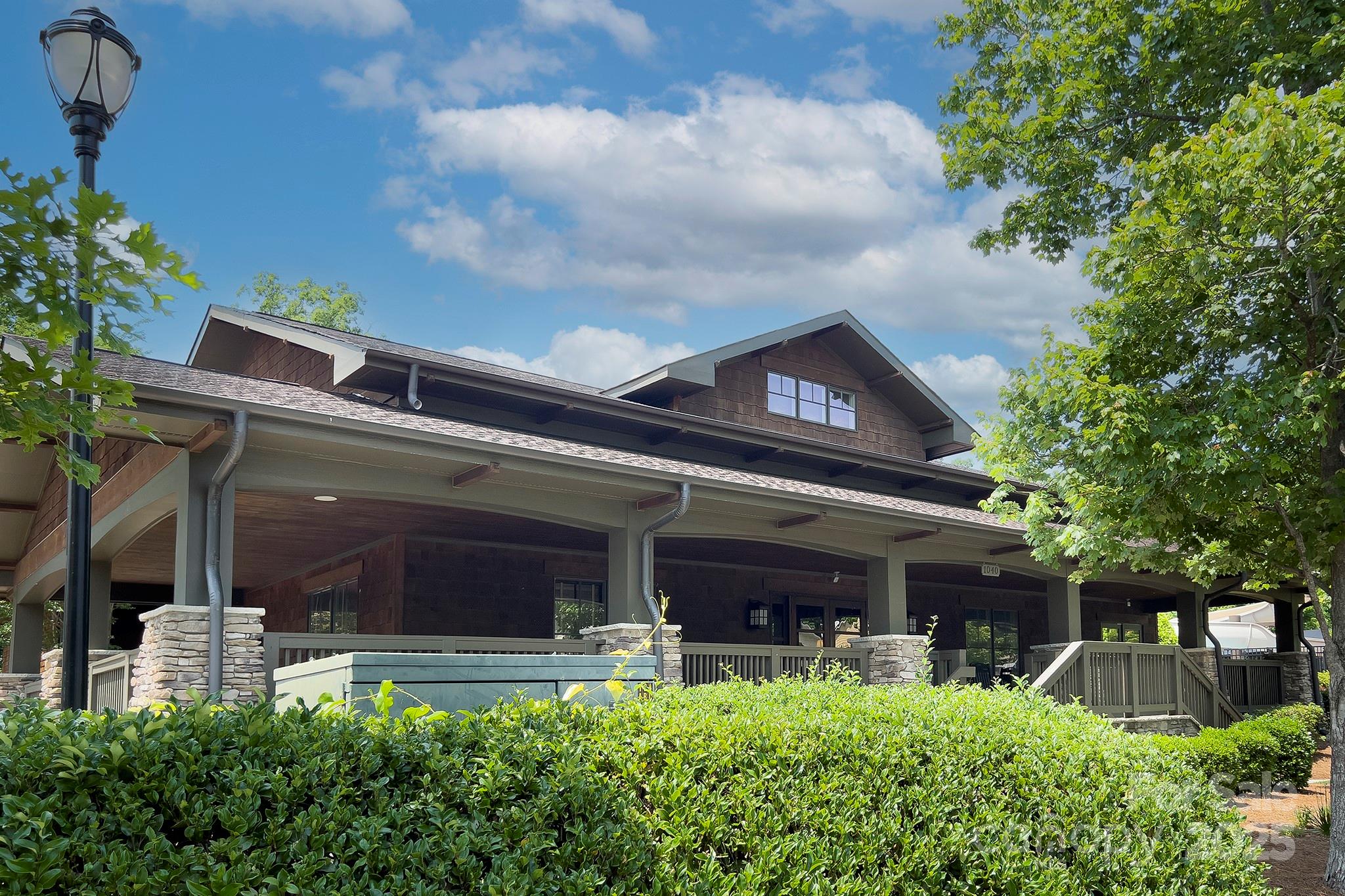 317 Annatto Way Tega Cay, SC 29708 - Photo 33 of 44 a front view of a house with garden