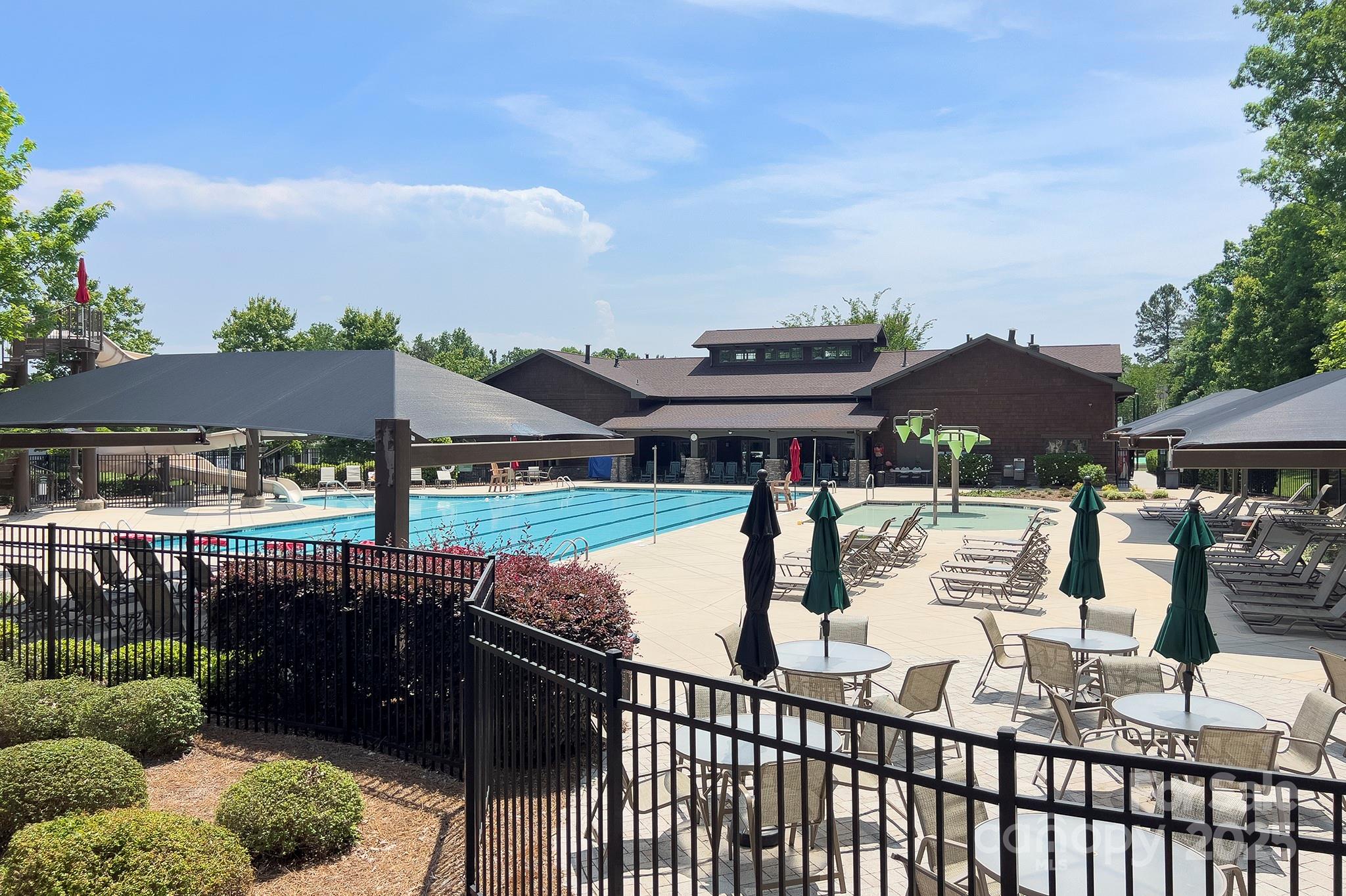 317 Annatto Way Tega Cay, SC 29708 - Photo 36 of 44 a view of balcony with outdoor seating and city view