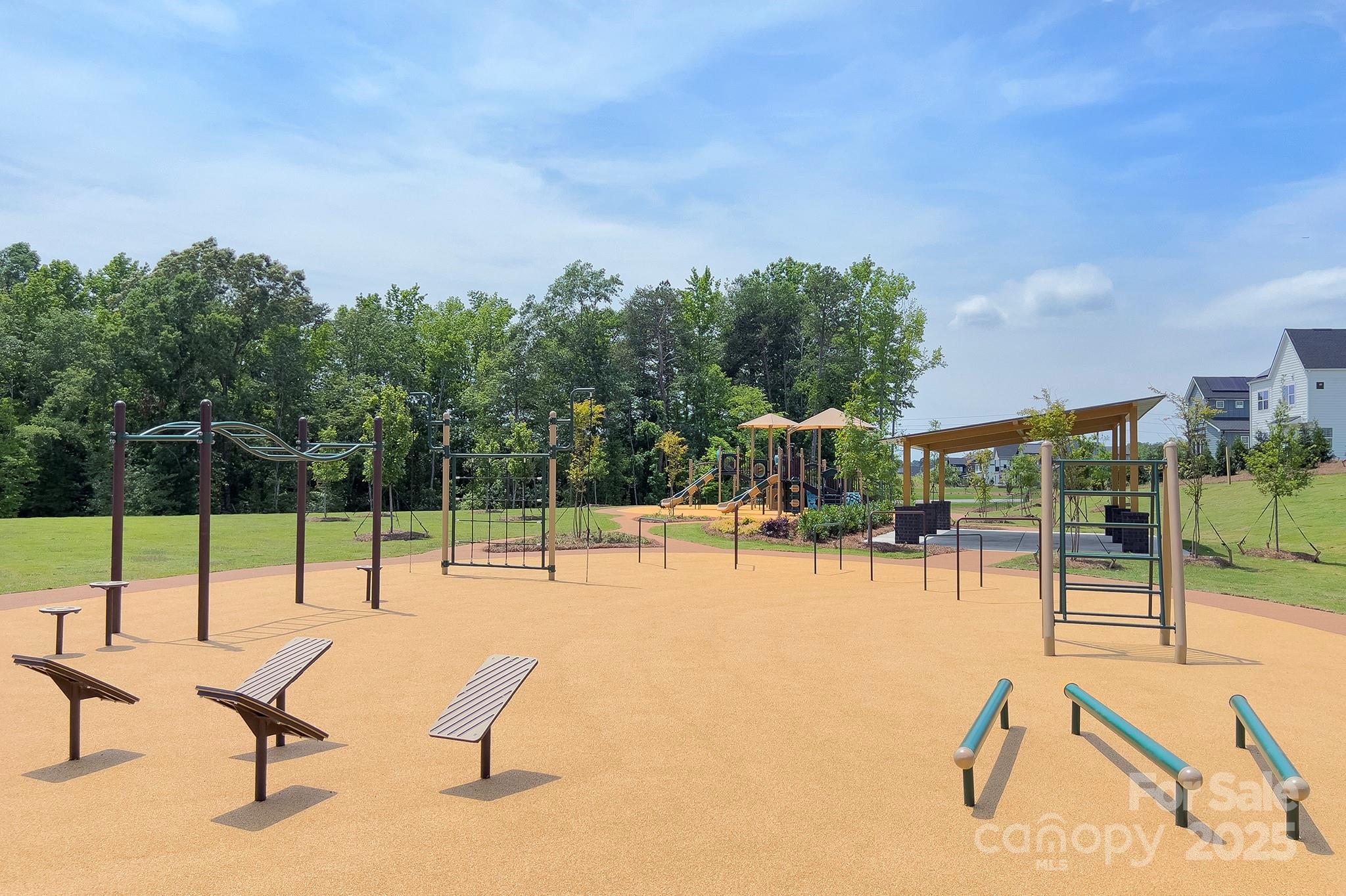317 Annatto Way Tega Cay, SC 29708 - Photo 41 of 44 a view of a swimming pool with a lawn chairs