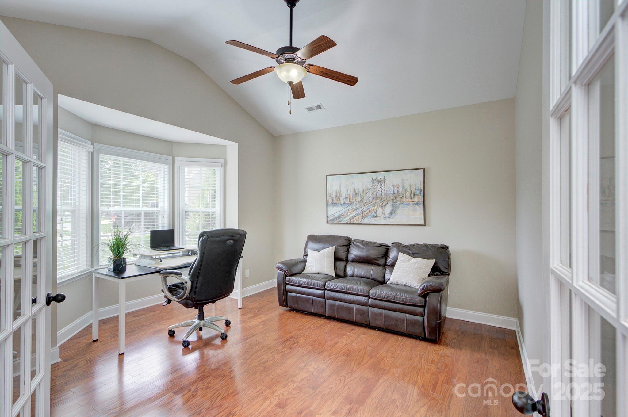 317 Annatto Way Tega Cay, SC 29708 - Photo 9 of 44 a living room with furniture and a large window