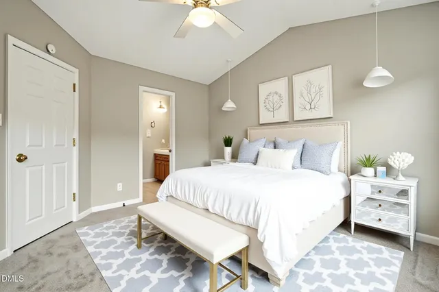 a bedroom with a bed and a view of bathroom