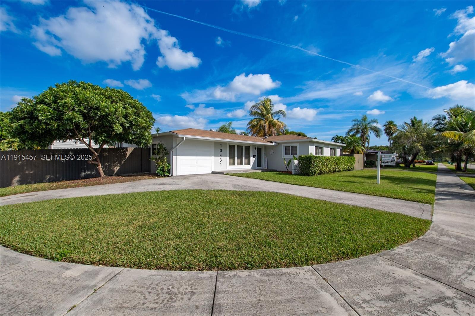 10431 Southwest 93rd Street Miami, FL 33176 - Photo 3 of 76 a view of a house with a backyard