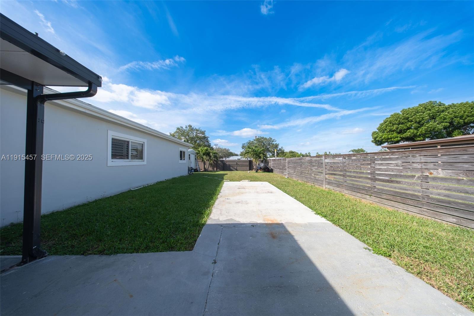 10431 Southwest 93rd Street Miami, FL 33176 - Photo 46 of 76 a view of a backyard with green space