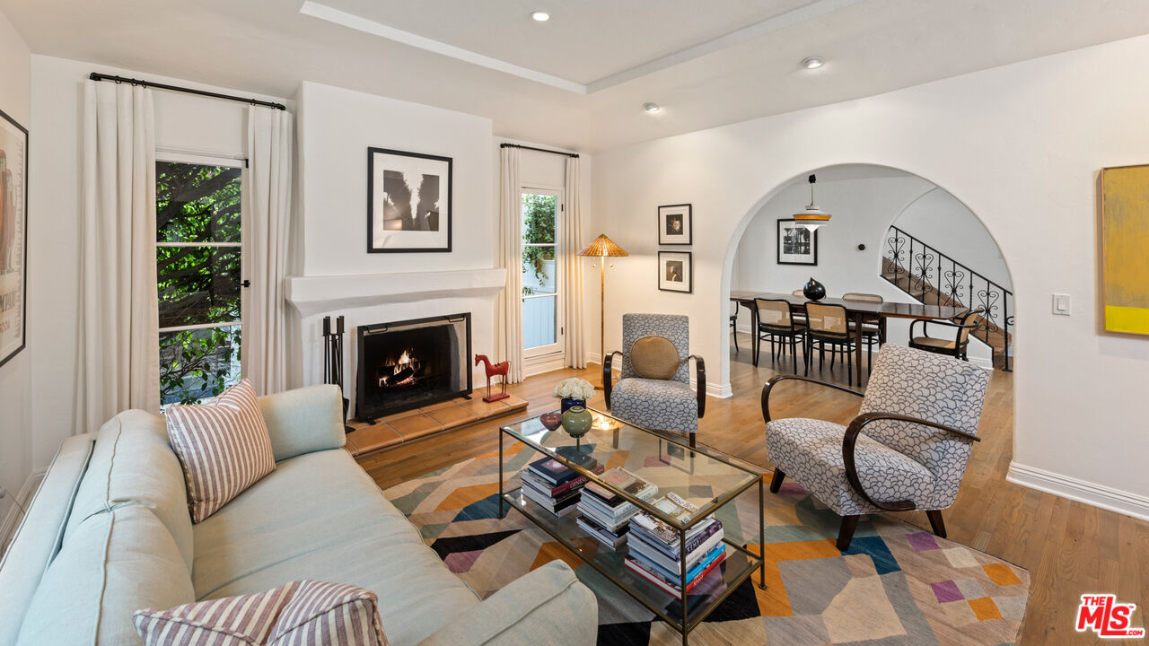 1146 Grant Avenue Venice, CA 90291 - Photo 2 of 20 a living room with furniture fireplace and a window