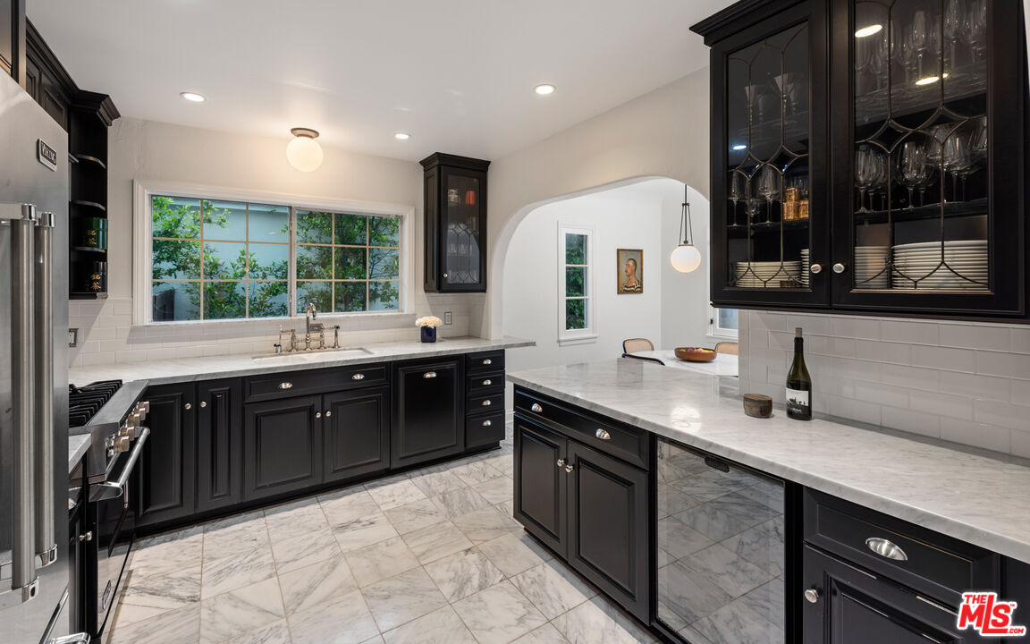1146 Grant Avenue Venice, CA 90291 - Photo 6 of 20 a large kitchen with a sink and large window