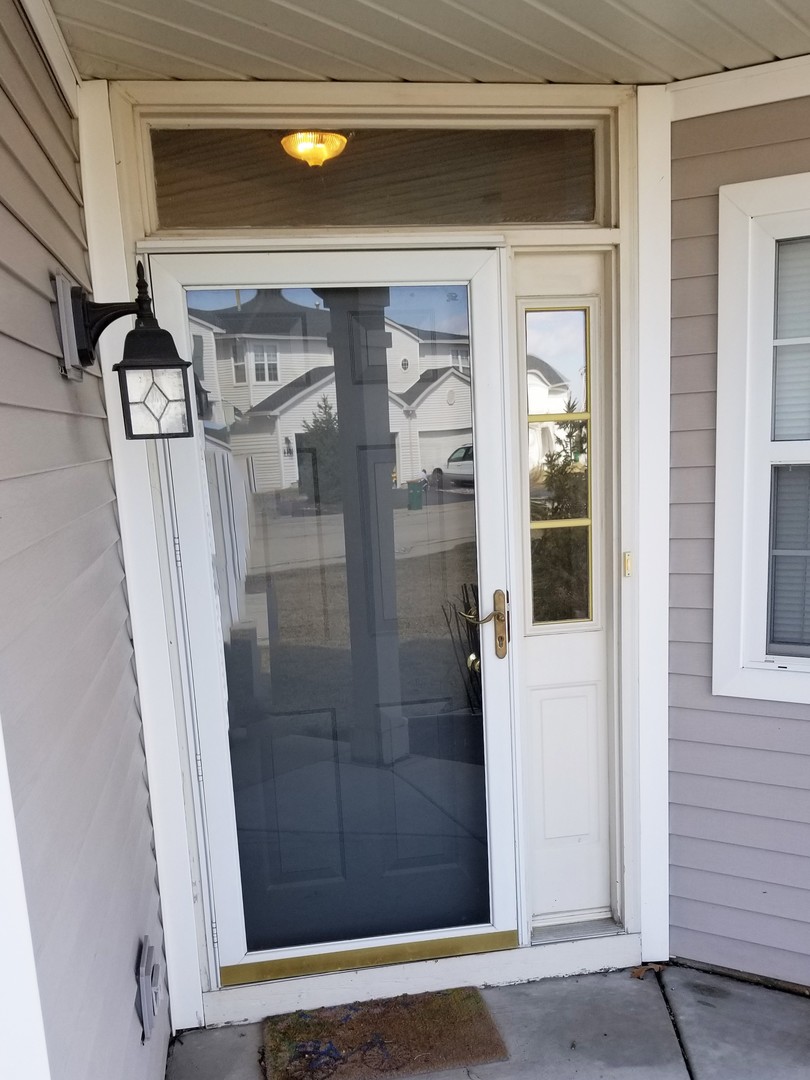 1037 Key Largo Drive Romeoville, IL 60446 - Photo 2 of 23 a view of front door