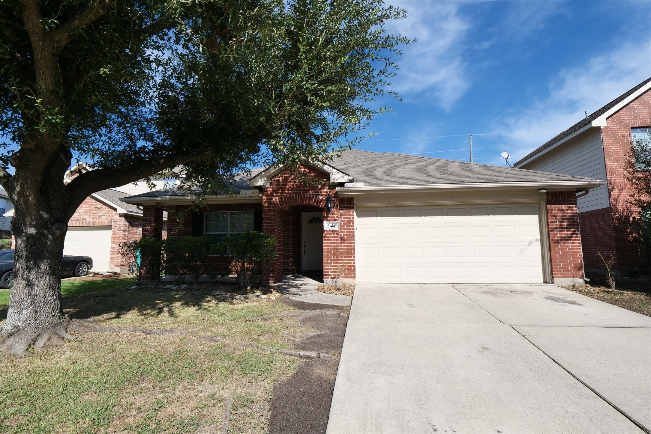 5414 Trammel Drive Spring, TX 77388 - Photo 1 of 28 a view of house with yard and garage
