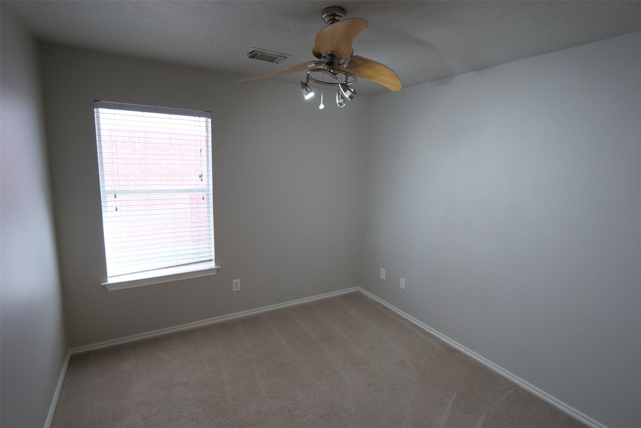 5414 Trammel Drive Spring, TX 77388 - Photo 24 of 28 an empty room with a window