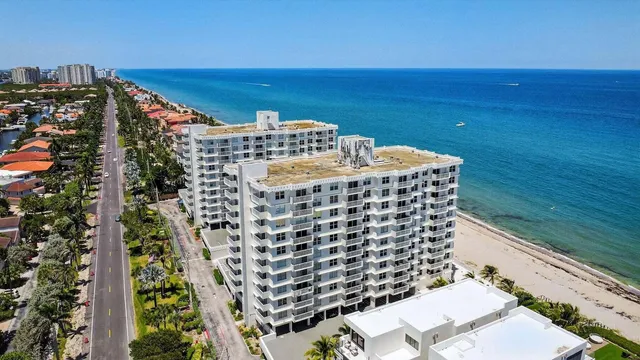 a view of a balcony with an ocean view