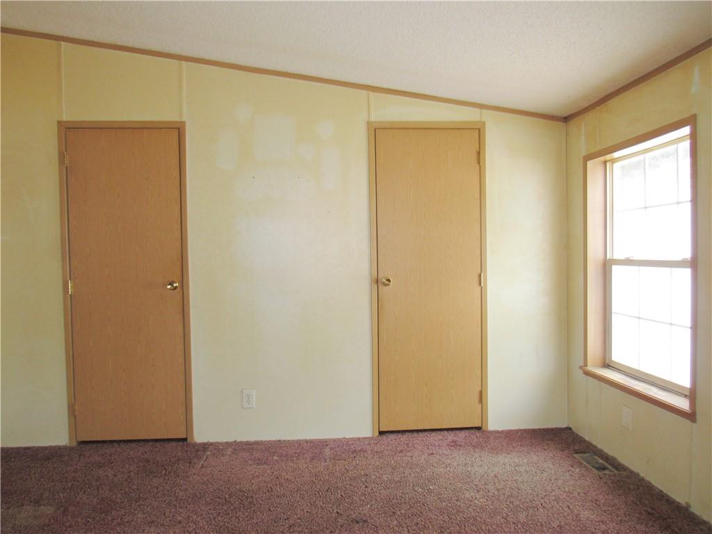 121 Hoy Run Road Spraggs, PA 15362 - Photo 21 of 25 a view of an empty room with a window