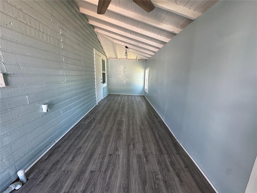 348 South Central Avenue, Unit U Umatilla, FL 32784 - Photo 13 of 13 a view of wooden floor in an empty room