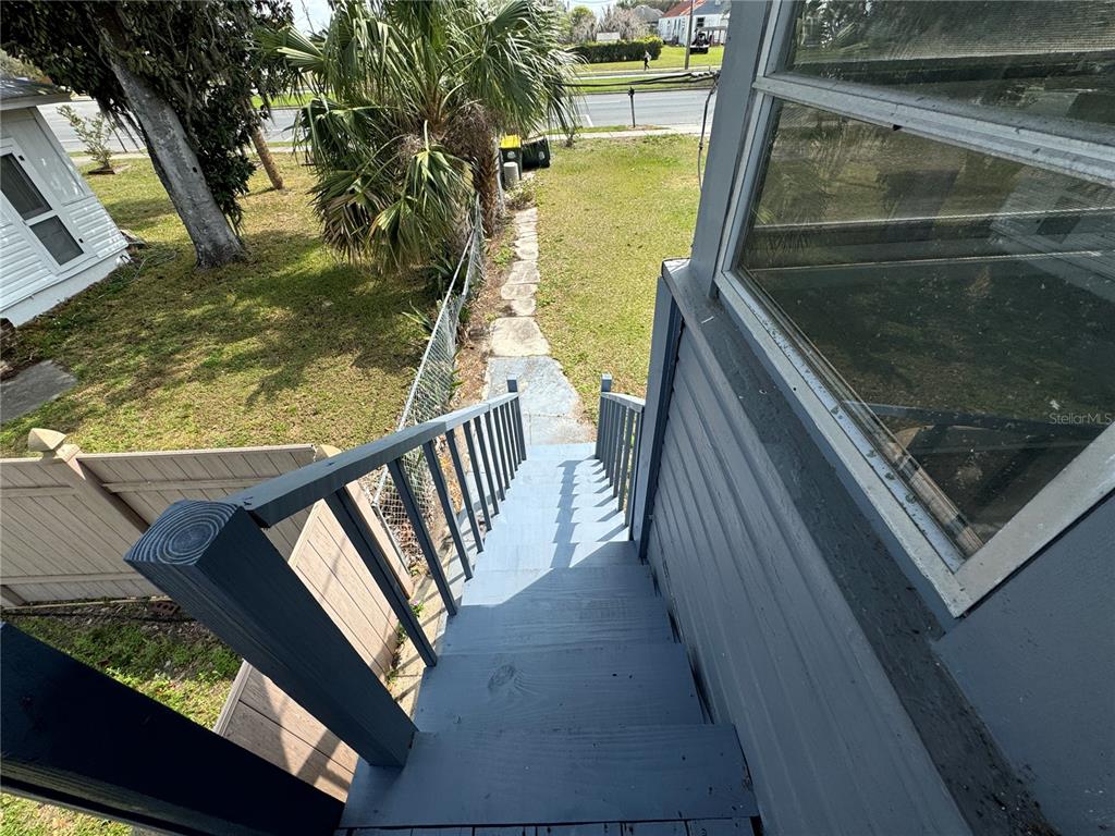 348 South Central Avenue, Unit U Umatilla, FL 32784 - Photo 2 of 13 a balcony with view of lake